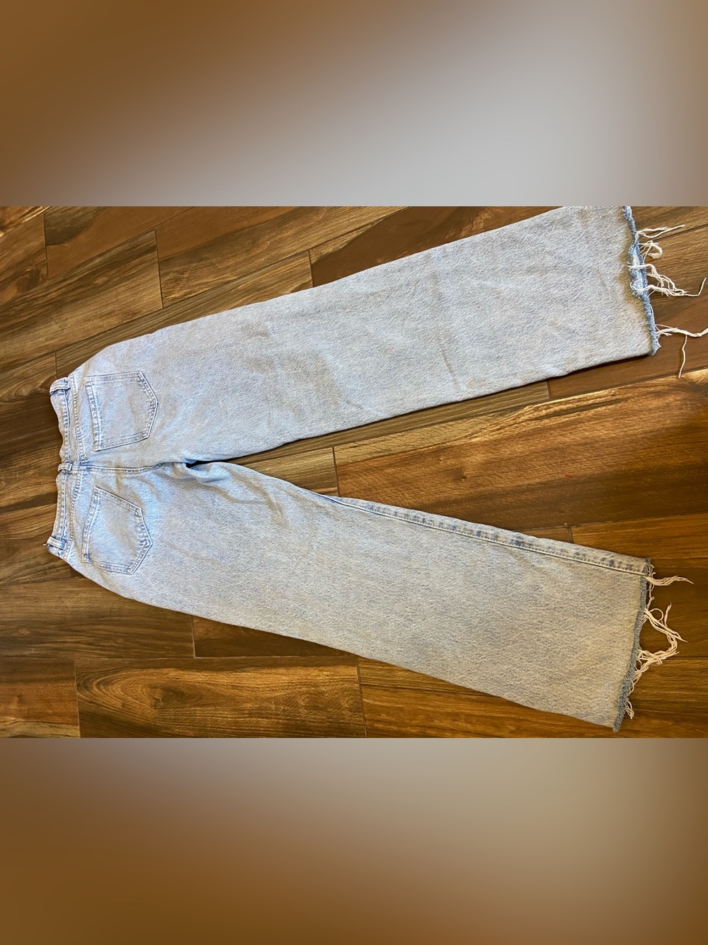 High-Rise Light Blue Distressed Wide-Leg Jeans - Women - Picture 4 of 8
